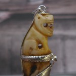 Antique Bear tooth carved in the form of a tiger seated on a pedestal 1 Genuine Red Ruby Handmade Silver Pendant