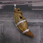 Very old Antique Bear tooth carved in the form of a tiger seated on a pedestal Handmade 925 sterling silver pendant.