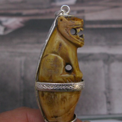 Very old Antique Bear tooth carved in the form of a tiger seated on a pedestal Handmade 925 sterling silver pendant.