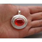 KG-064 Beautiful handmade-hand carved sterling silver case pendant setting on oval red-orange naga eye Thai amulet crytal. 